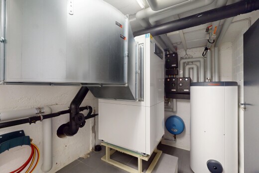 laundry area featuring gas water heater