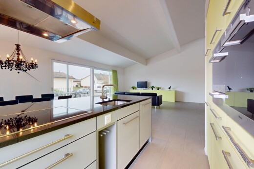 kitchen featuring sink, exhaust hood, white cabinets, beam ceiling, and pendant lighting