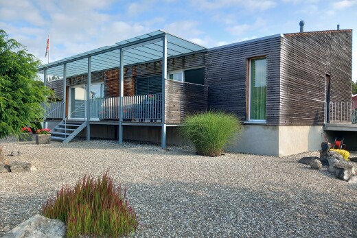 view of property featuring a wooden deck