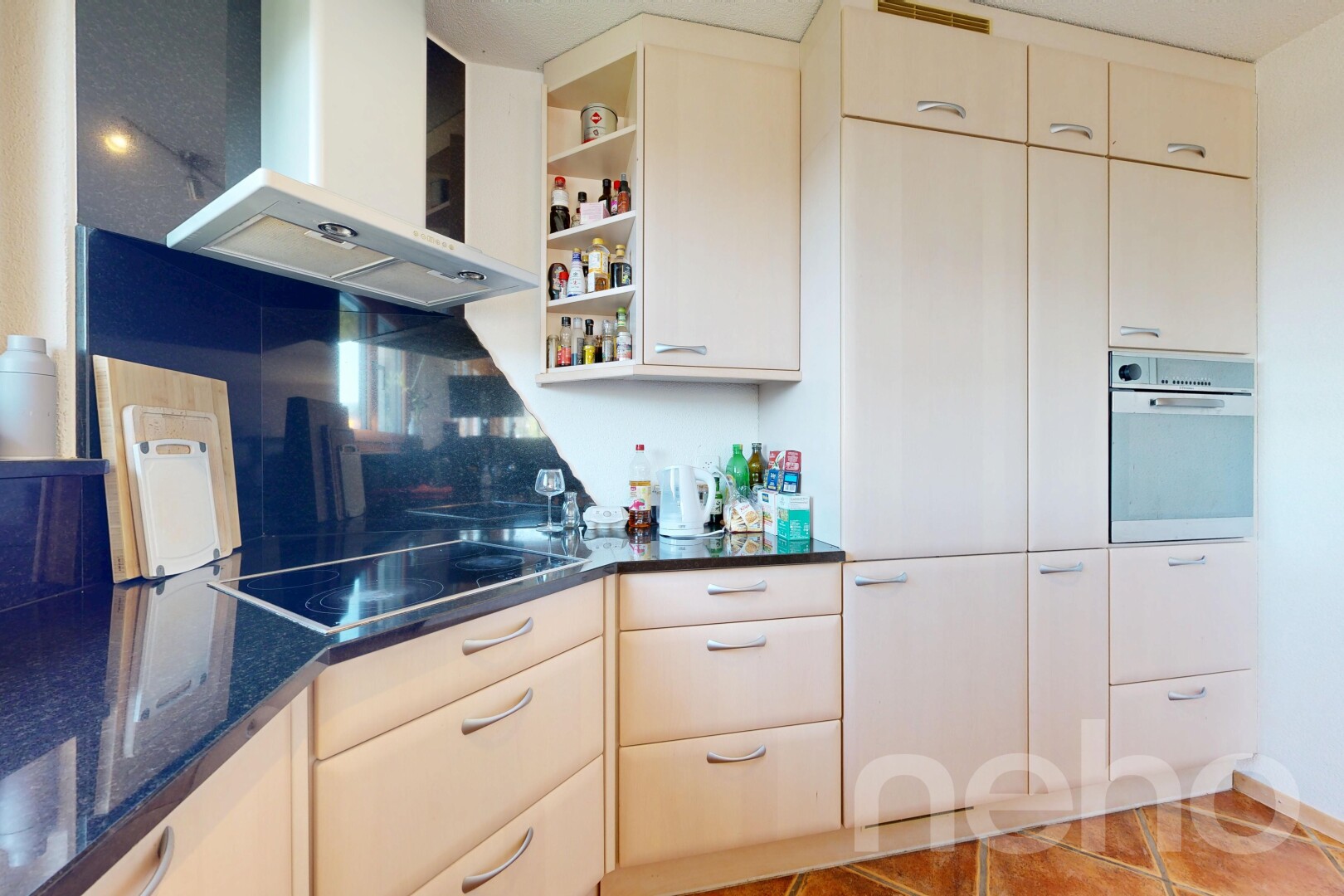 kitchen with range hood, stainless steel oven, open shelves, black electric stovetop, and light tile patterned floors