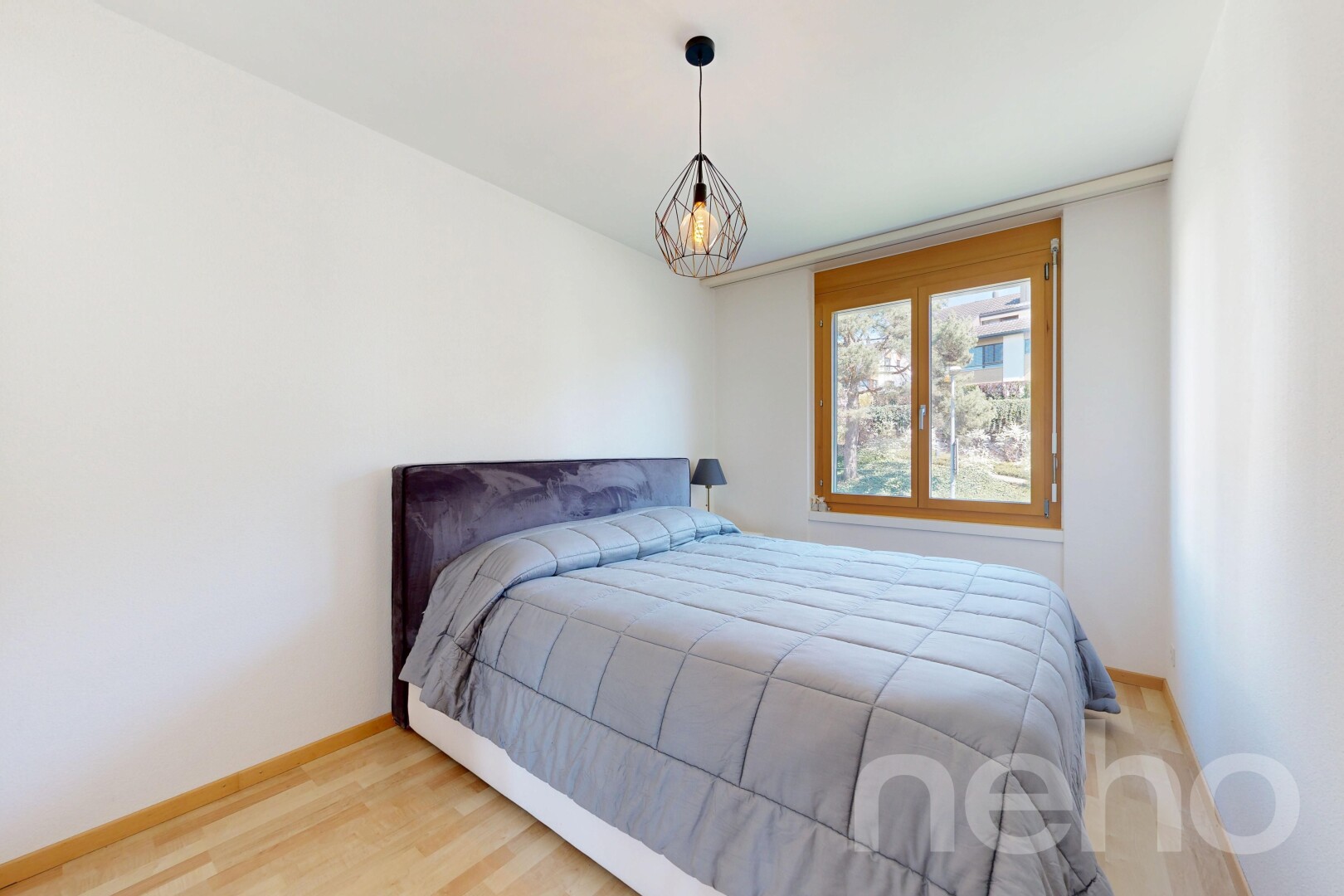 room / bedroom with light wood finished floors