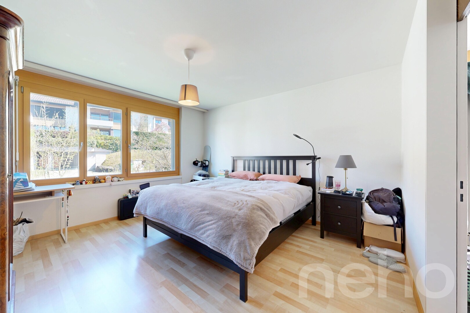 room / bedroom with light wood finished floors