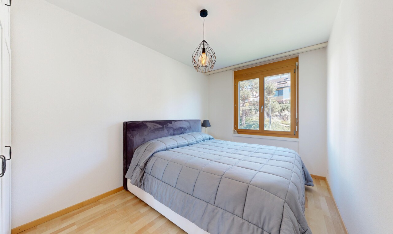 room / bedroom with light wood finished floors