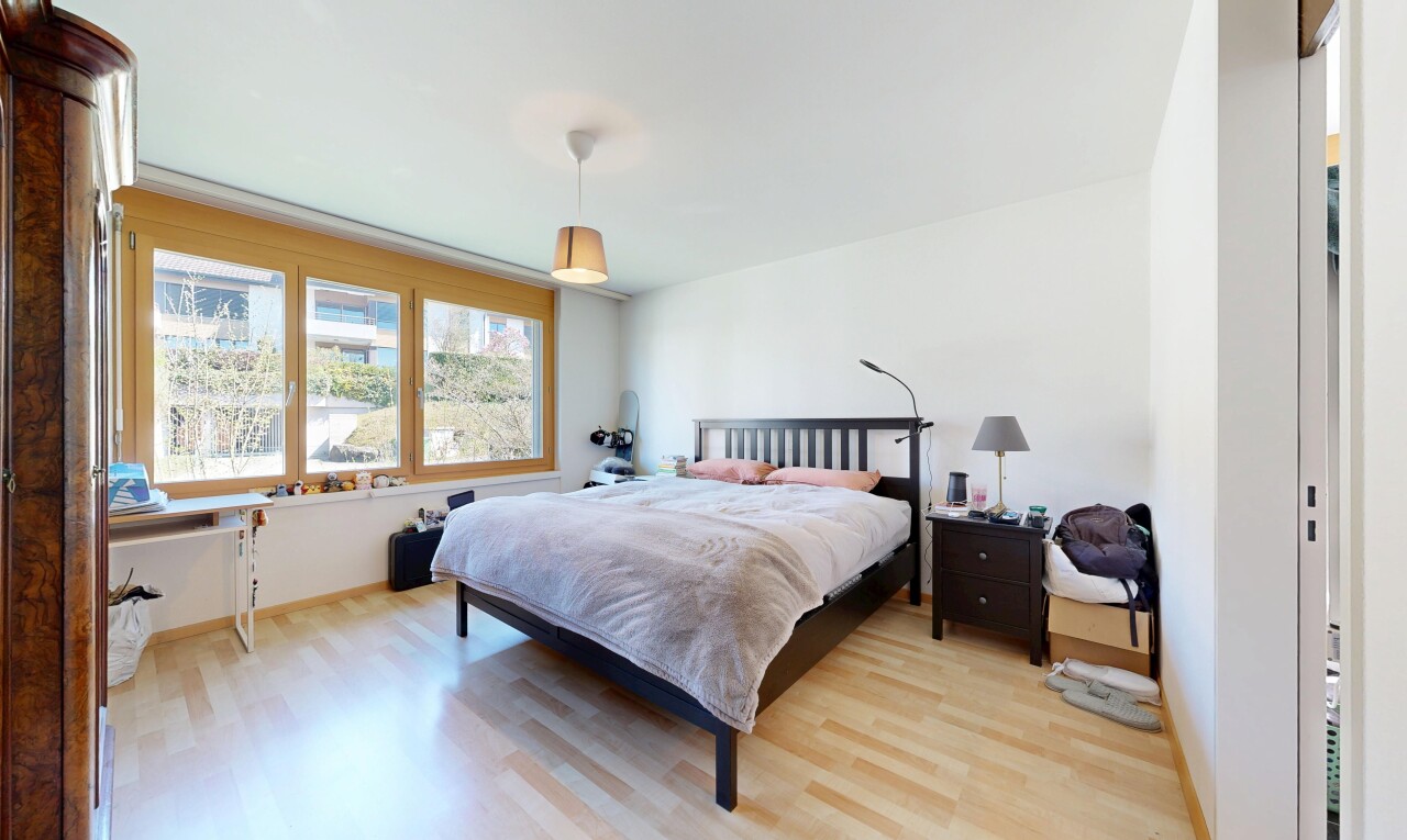 room / bedroom with light wood finished floors