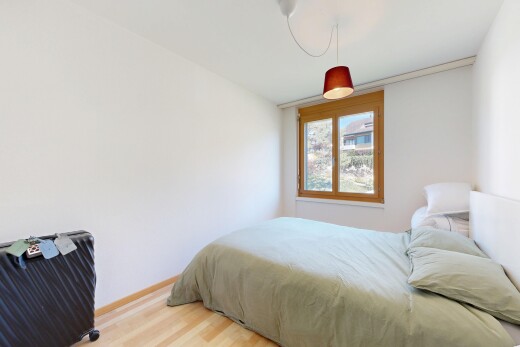 chambre avec cloison sèche, drywall, sol en finition bois, wood finish floor, et inside property