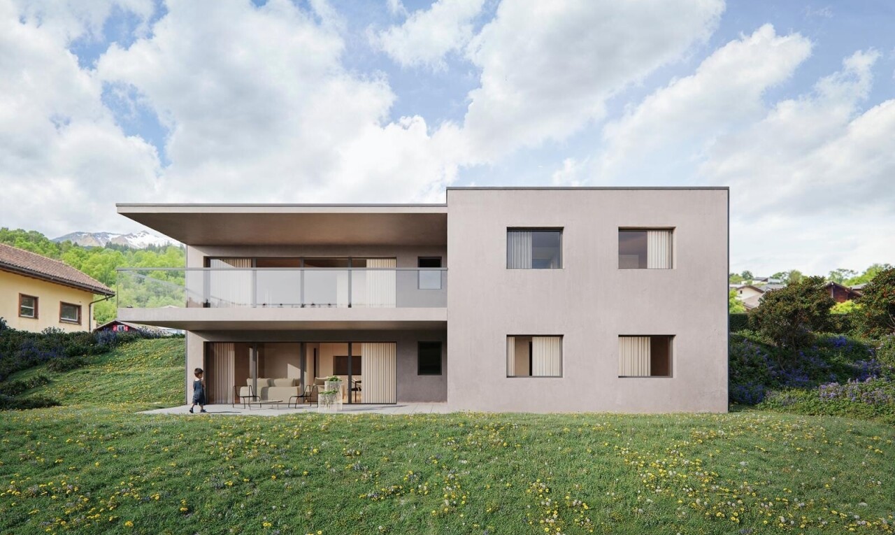 außenansicht mit terrasse, rasen, stuckverkleidung, und day time