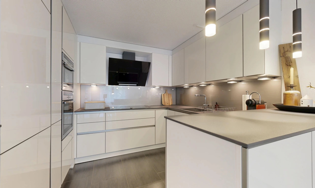 cuisine avec hotte, dark floor, armoires à panneau plat, flat panel cabinets, et évier