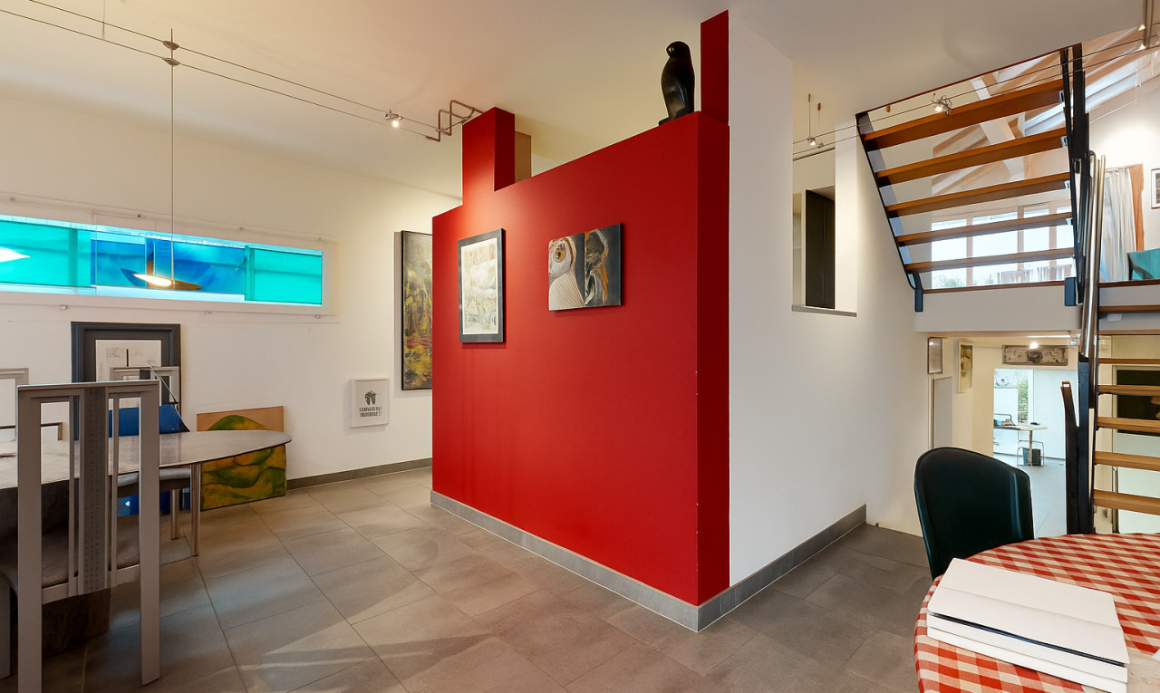 dining room featuring stairs and baseboards