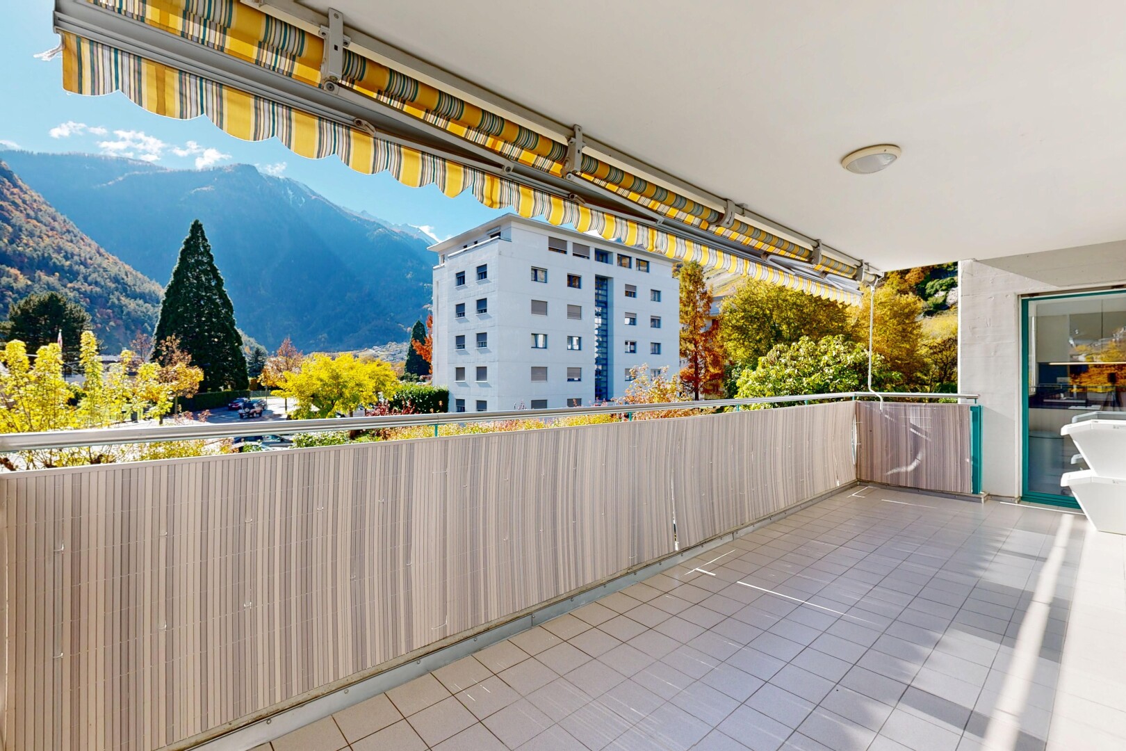 terrace with a mountain view and a patio area