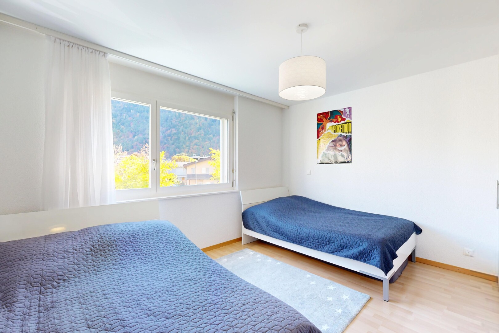 room with wood finished floors and baseboards