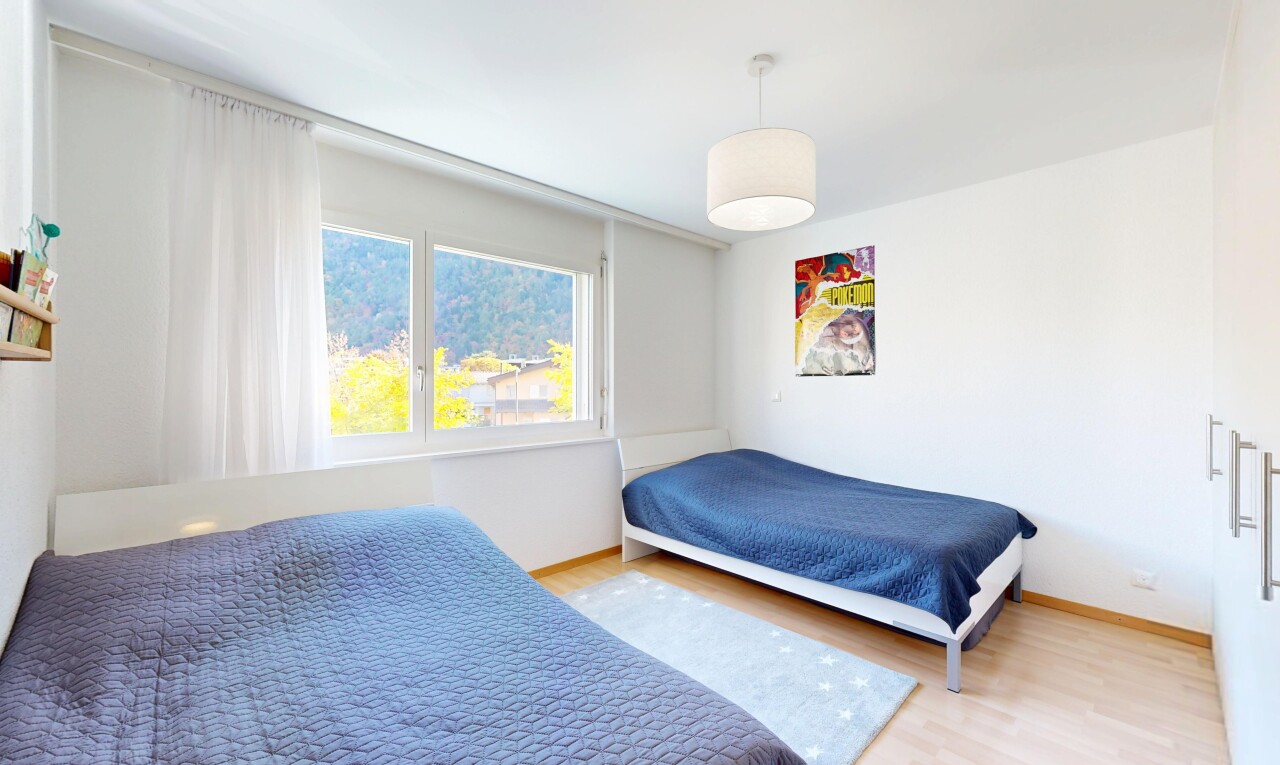 room with wood finished floors and baseboards