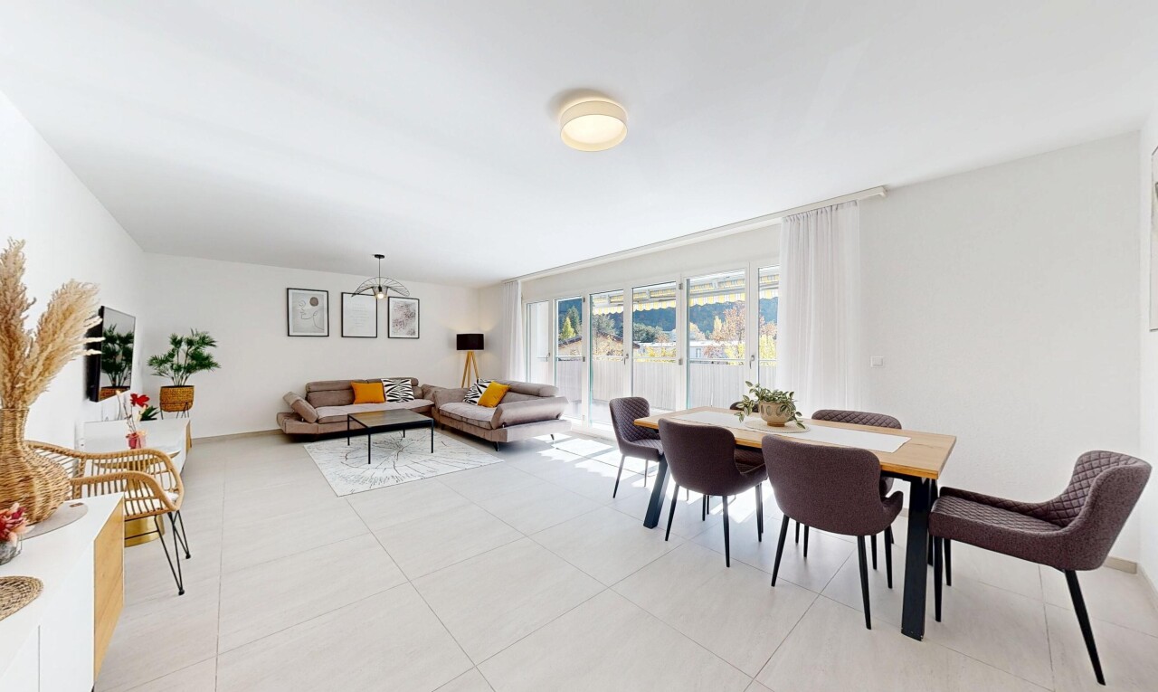 living / dining area with light tile patterned flooring