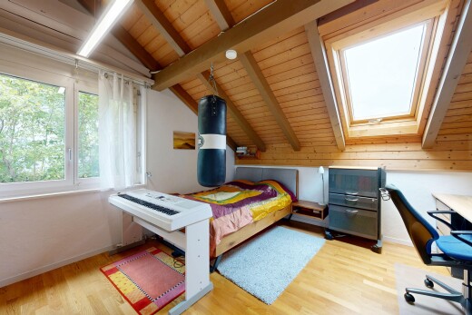 zimmer / schlafzimmer mit inside property, zusätzliches zimmer, beamed ceiling, balkendecke, und wood finish floor