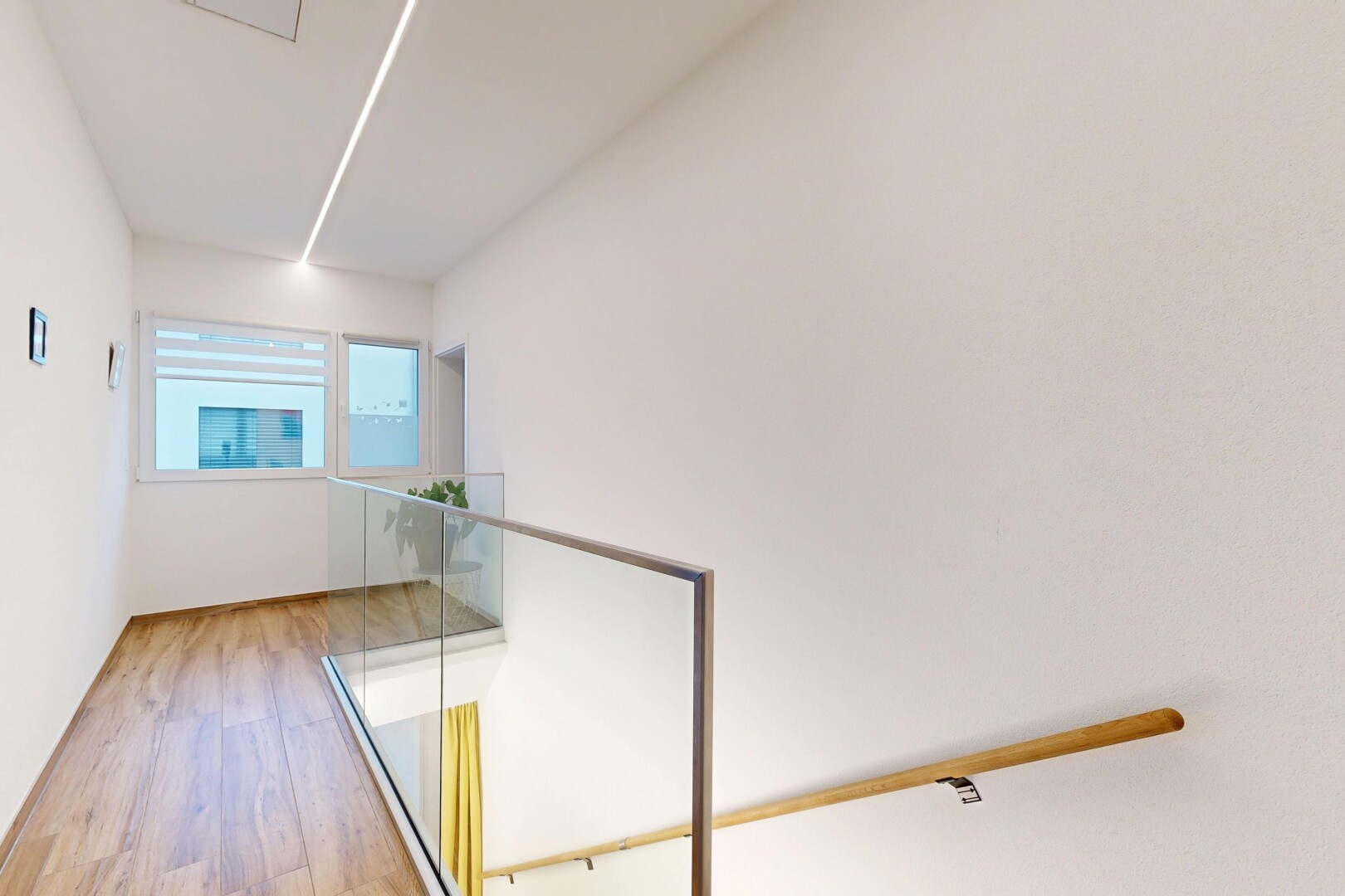 stairs with wood finished floors