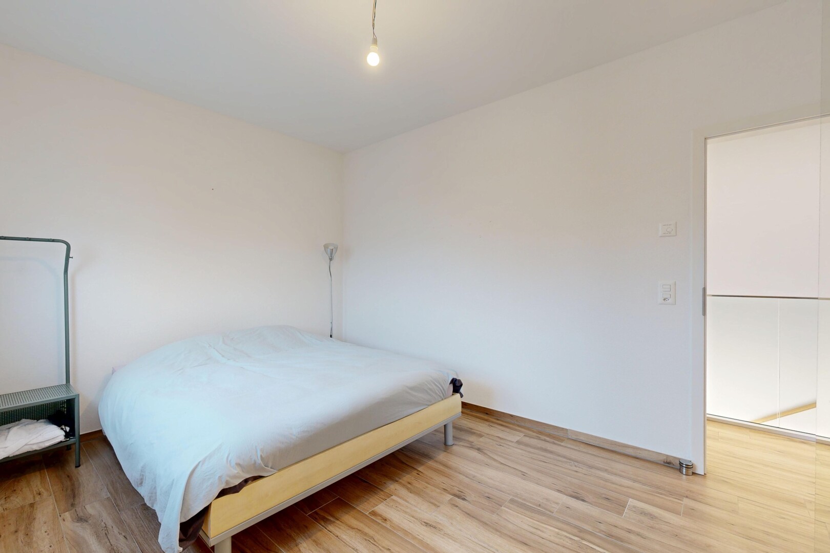 room / bedroom featuring light wood-style flooring