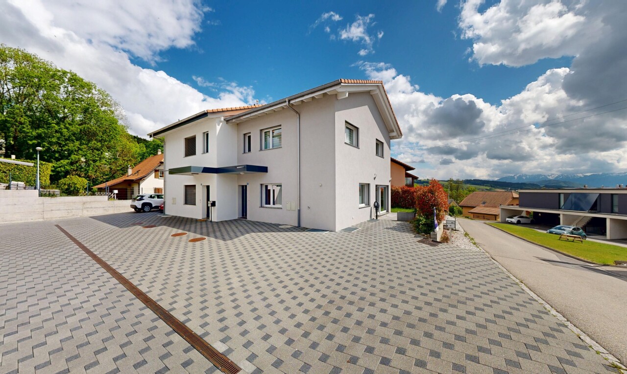 view of home featuring stucco siding