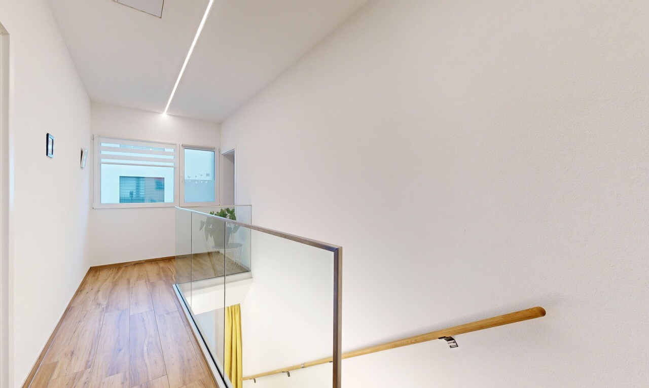 stairs with wood finished floors