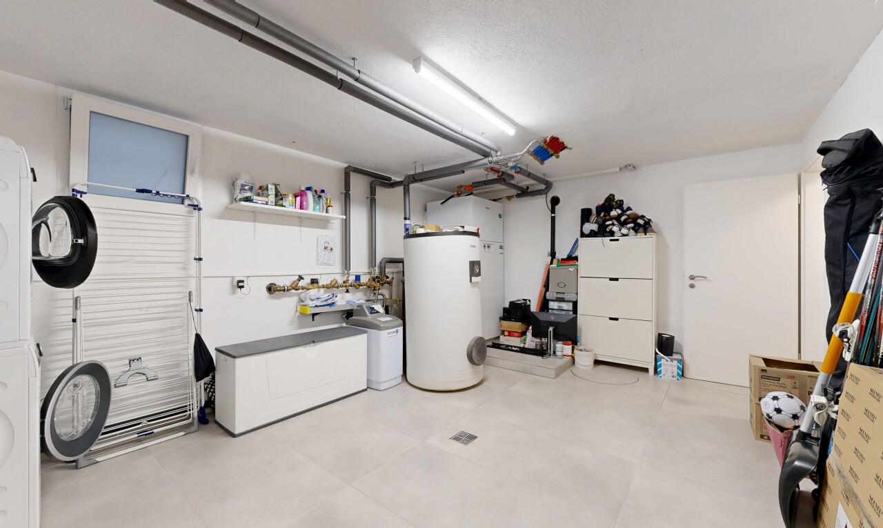 view of parking with water heater