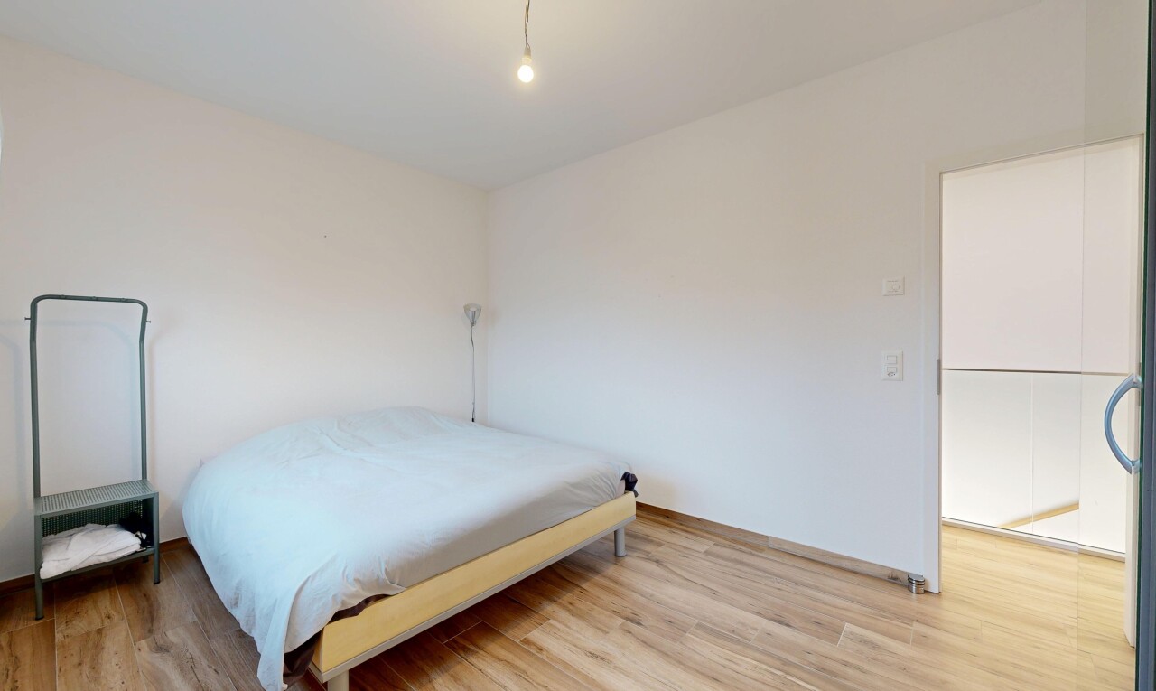 room / bedroom featuring light wood-style flooring