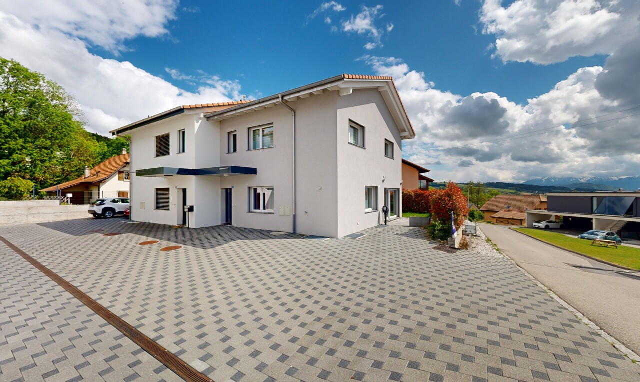 view of home featuring stucco siding