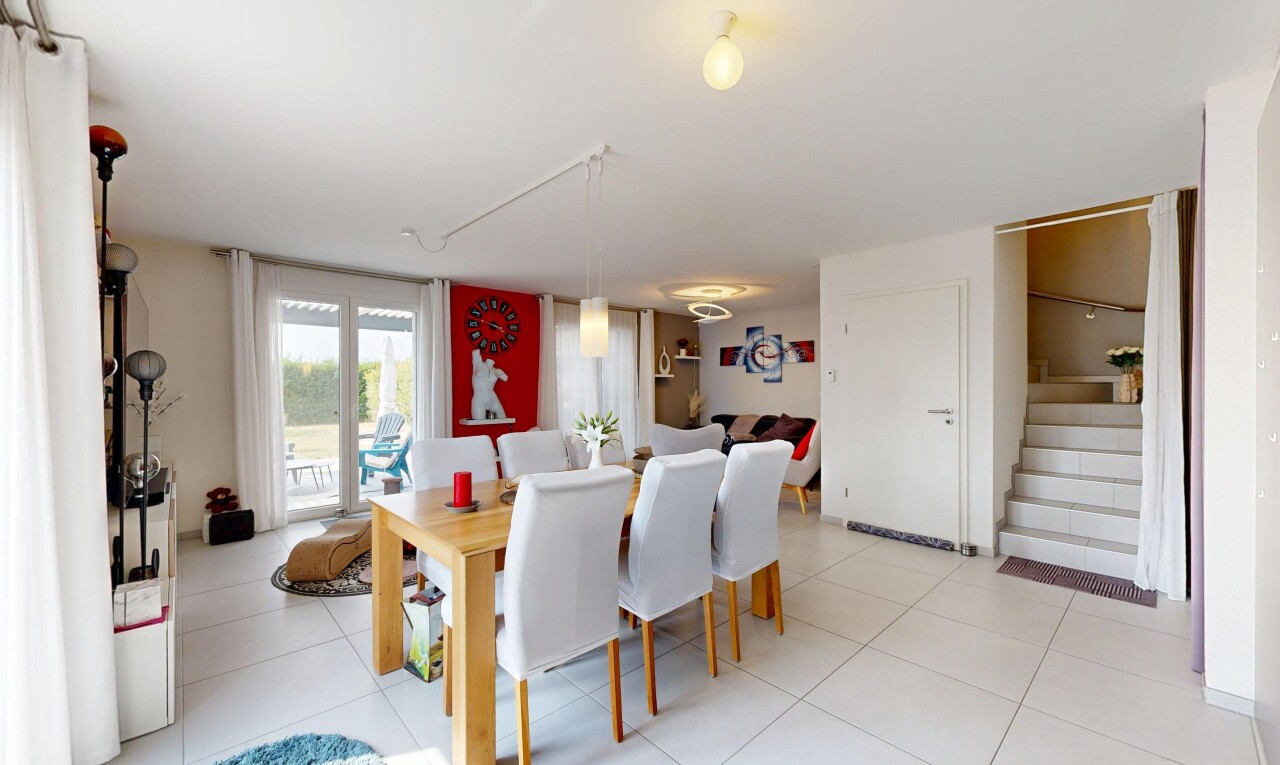 salle à manger avec escaliers, cloison sèche, drywall, other stairs, et inside property