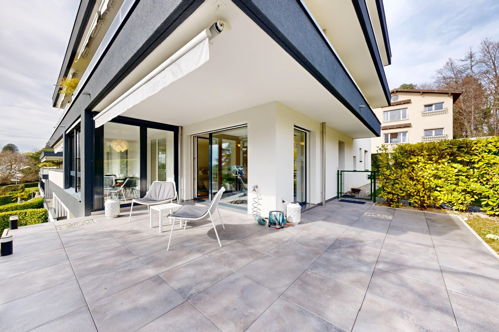 terrace featuring a patio and a gate