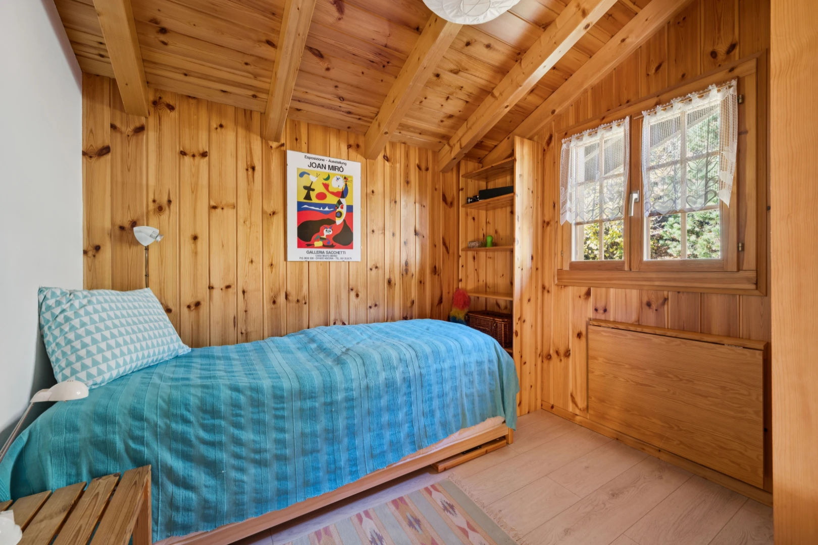 room / bedroom with wood ceiling, vaulted ceiling with beams, light wood-style flooring, and wood walls