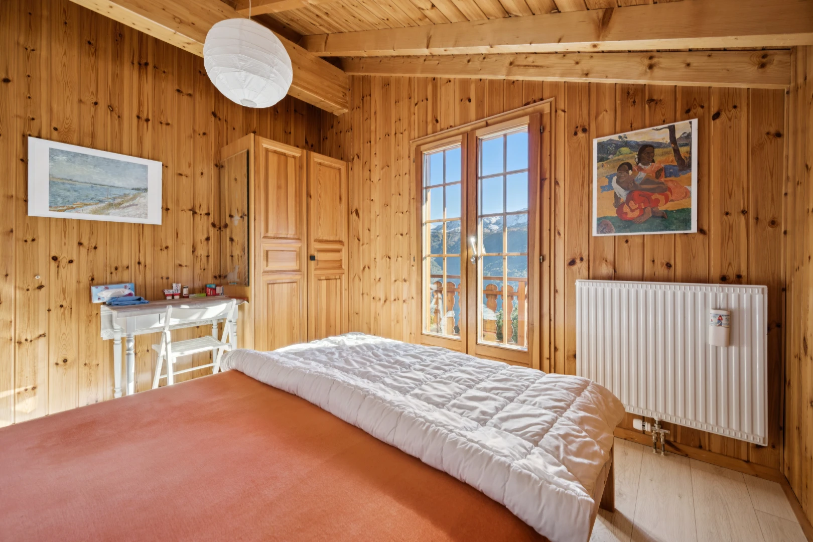 room with radiator heating unit, light wood-style floors, wooden ceiling, wood walls, and vaulted ceiling with beams