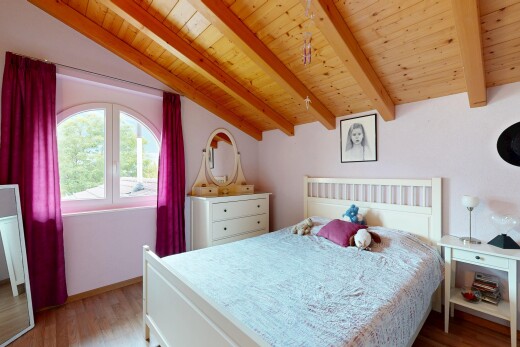 room / bedroom featuring light wood-type flooring, wooden ceiling, and vaulted ceiling with beams