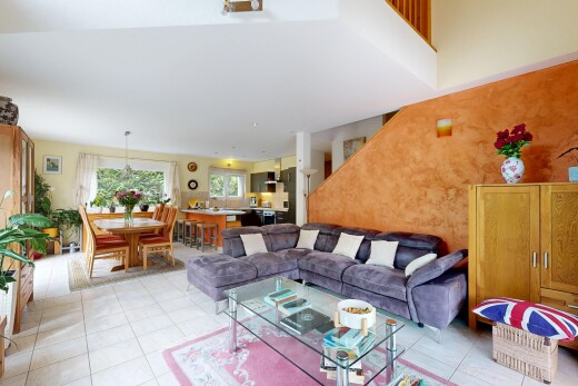 living room featuring light tile patterned flooring