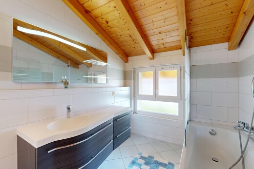 kitchen featuring light countertops, tile walls, wood ceiling, vaulted ceiling with beams, and light tile patterned floors