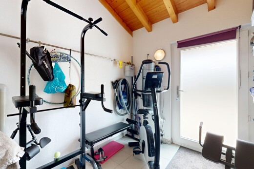 gym featuring wooden ceiling and lofted ceiling with beams
