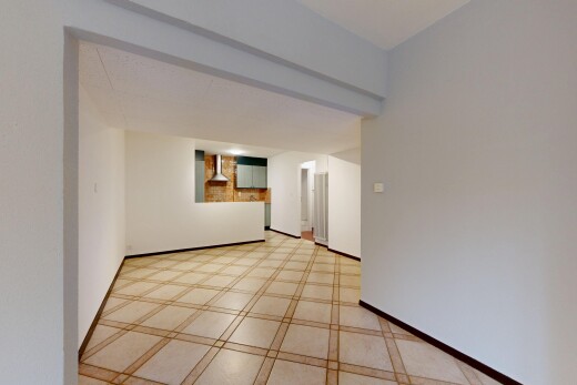 spare room featuring baseboards