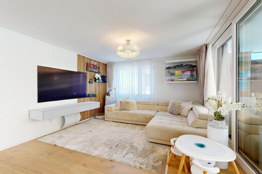 wohnzimmer mit fernseher, holzfußboden, wood finish floor, gipskartonwand, und drywall
