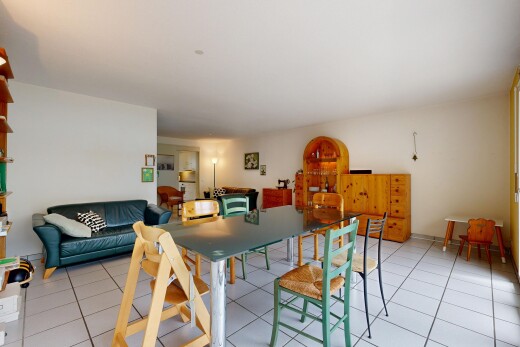 living / dining room featuring light tile patterned flooring
