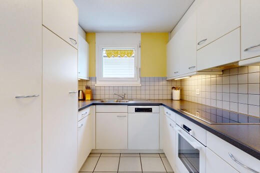küche mit dark countertops, arbeitsplatten, ofen, white cabinets, und weiße schränke