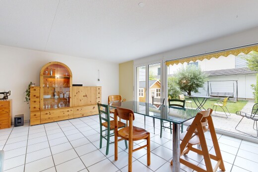 dining space with light tile patterned floors
