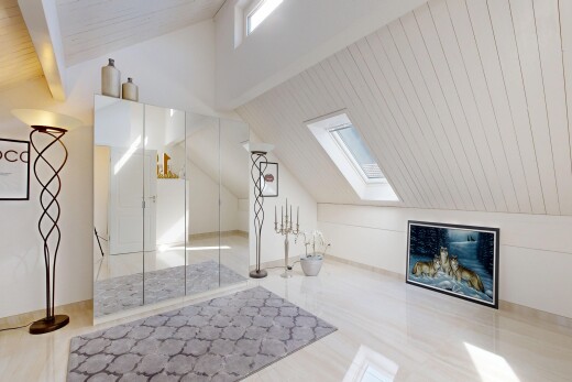 empty room featuring lofted ceiling with beams, wood ceiling, and a skylight