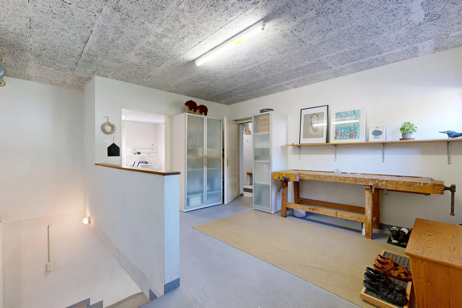 reception area / building lobby featuring stairs and an upstairs landing