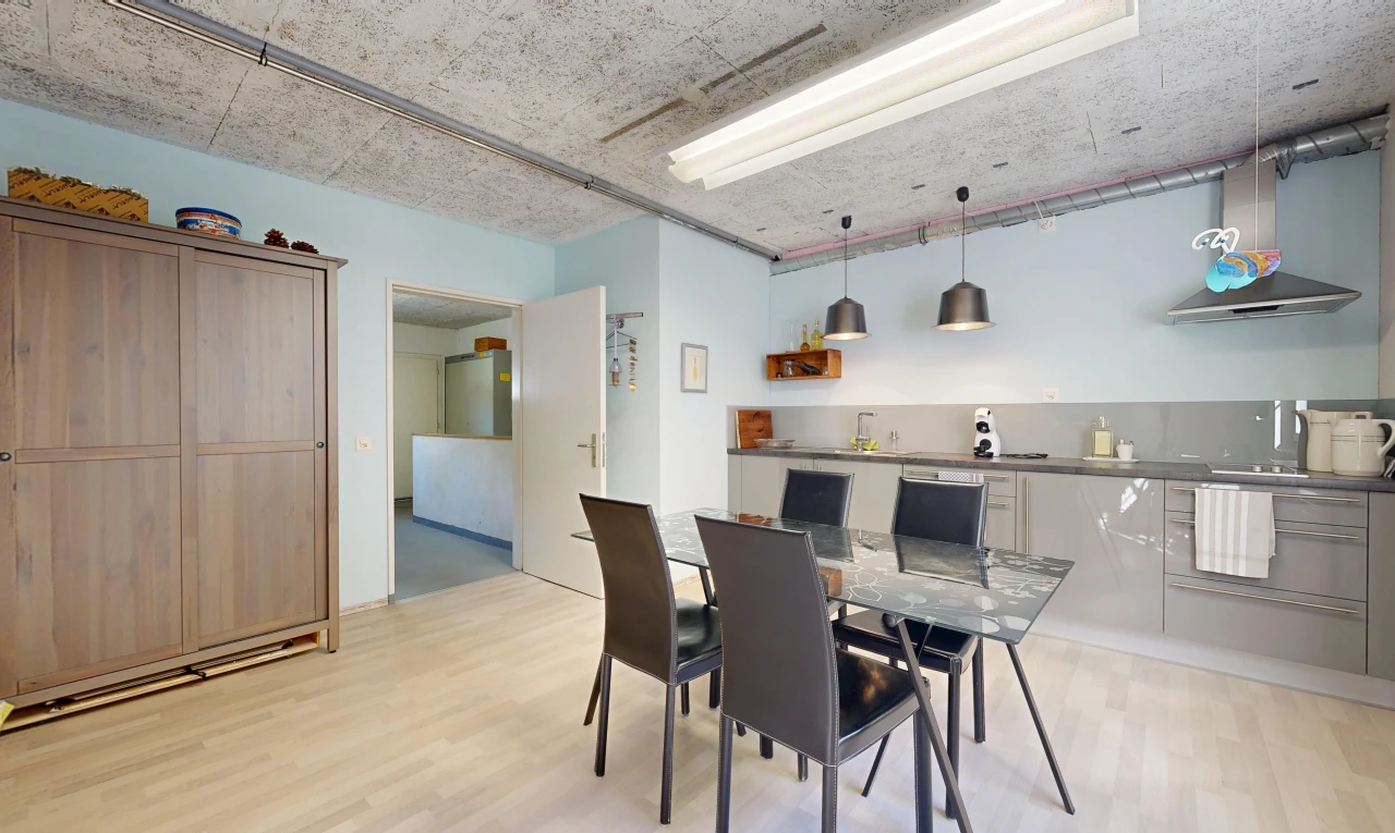dining room featuring pendant lighting and light wood-style flooring