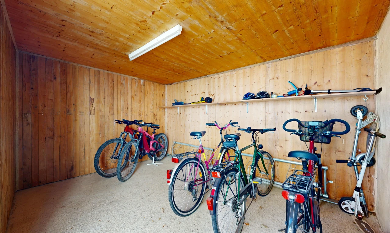 gym featuring wood walls and wood ceiling