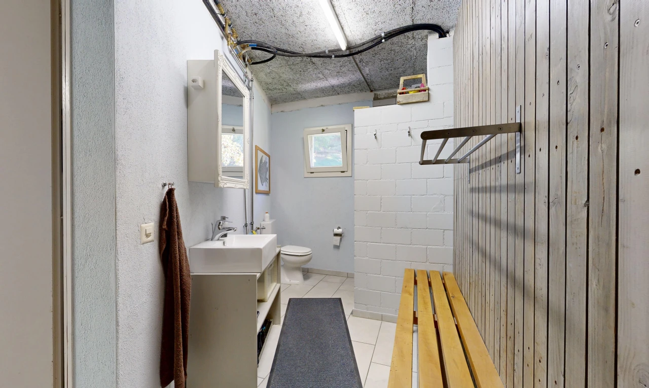 full bathroom with vanity and light tile patterned floors