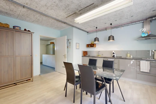 dining room featuring pendant lighting and light wood-style flooring
