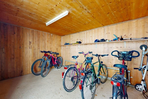 gym featuring wood walls and wood ceiling