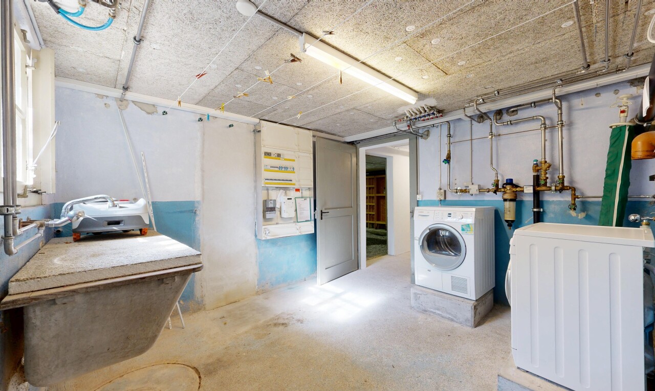 wäschekammer mit concrete floor, betonboden, inside property, wäscherei, und drywall