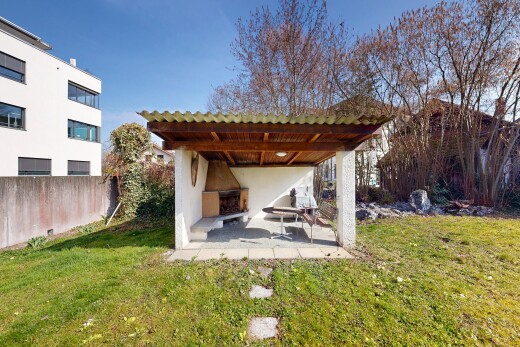 façade avec pelouse, bardage en stuc, day time, et terrasse