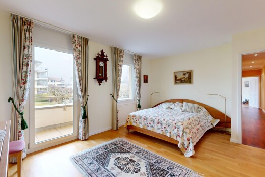 room / bedroom featuring light wood-style flooring and access to outside
