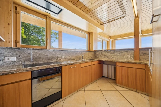 küche mit ofen, stein arbeitsplatten, stone countertops, light floor, und mittelbraune schränke