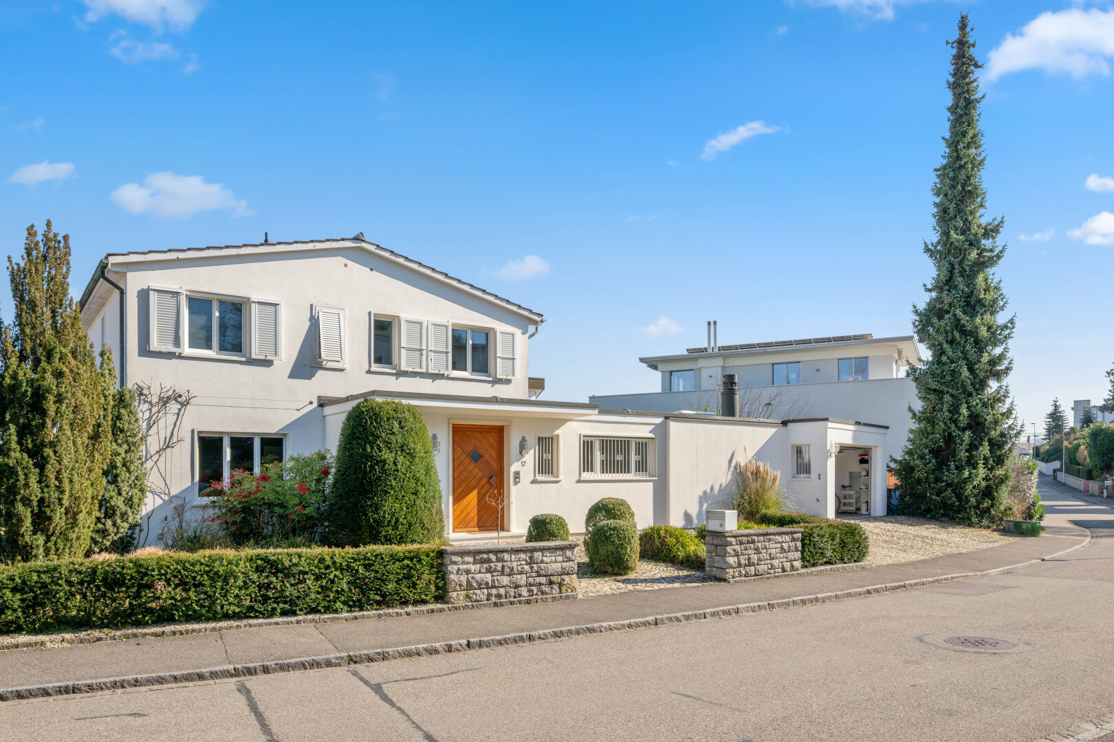 außenansicht mit property visible, day time, und stuckverkleidung