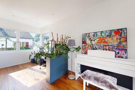 wohnzimmer mit inside property, gipskartonwand, drywall, holzfußboden, und wood finish floor